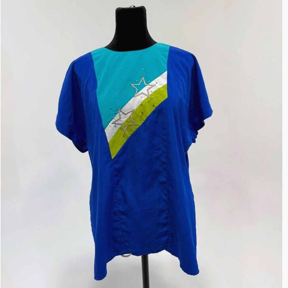 City Girls	vintage 80s blue shift top with silver embroidered star detail